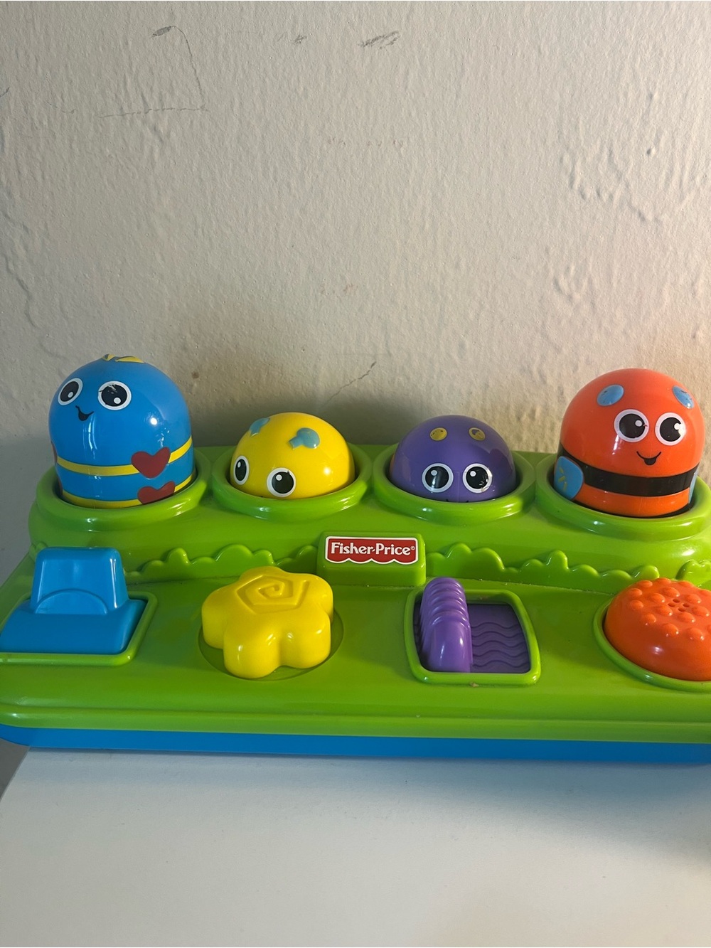 Fisher-Price Bright Pop-Up Pals Toy - Blue, Yellow, Purple, Orange